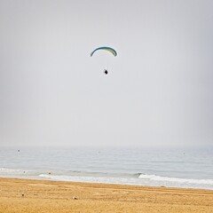 powered paragliding by the beach