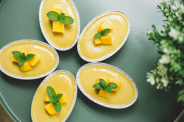 Thai Mango Cake with fresh mango on the top