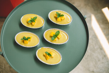 Thai Mango Cake with fresh mango on the top