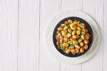 Spanish sauteed garlic button mushroom, copy space