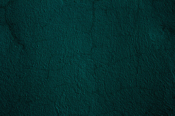 Petrol colored wall texture background with textures of different shades of petrol also called teal