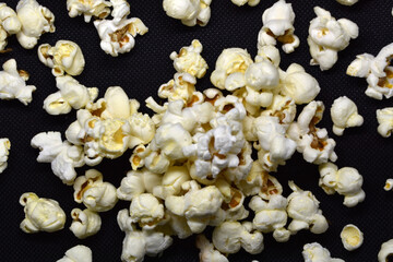 Popcorn isolated on a black background suitable for presentations.