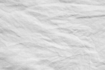 Fototapeta na wymiar white wrinkle cotton shirt fabric cloth texture pattern background