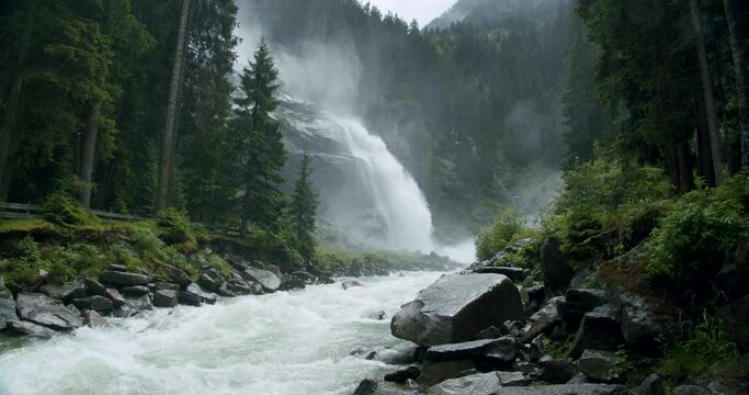 Powerfull famous Krimml Waterfalls in High Tauern National Park forest, Austria.
