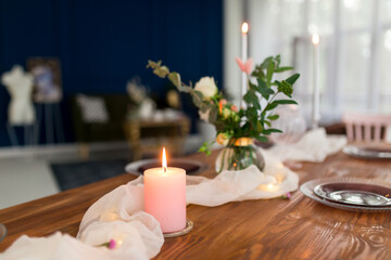 Romantic decorated wooden table with flowers 