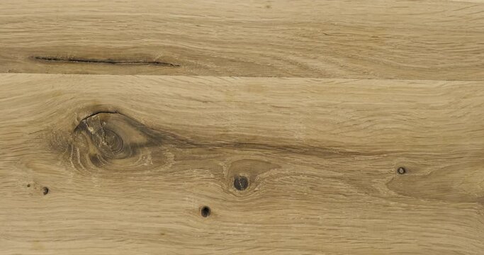 Rotation, natural oak plank. Plank texture with crack and knots.