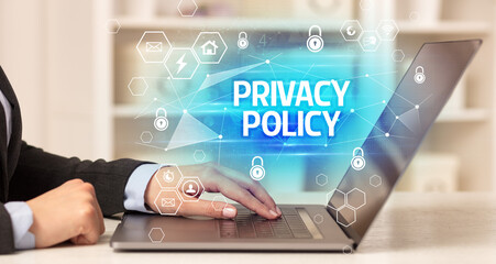 PRIVACY POLICY inscription on laptop, internet security and data protection concept, blockchain and cybersecurity