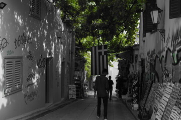 WHITE and BLACK, view of the street and country flag in Athens, Greece, Europe 