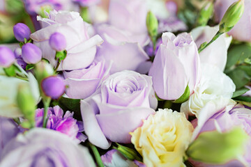 Bouquet of fresh purple flowers close up, holiday background.