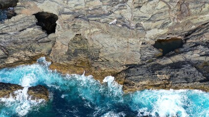 mighty ocean spitting out the cliffs