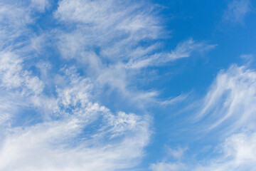 Fototapeta premium Beautiful Cirrus clouds on the blue sky during summer sunny day. Theme of beautiful landscapes. 