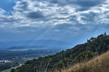 Naklejka premium mountain view sky clouds forest