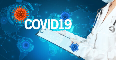 Doctor fills out medical record with COVID19 inscription, virology concept