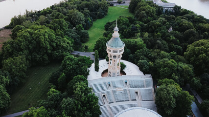 Aerial top down shot of famous water tower and outdoor stage theater on margaret island in Budapest