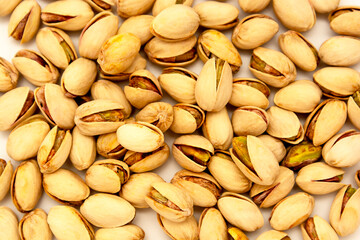 Pistachio nuts background texture, top view, healthy snack.