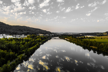 reflecting clouds in the river