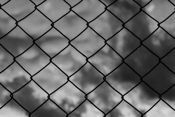 Grid with blurred sky behind as background (Black and White)