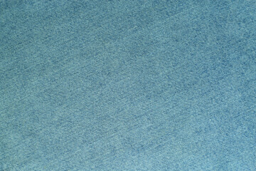 Denim jeans light blue texture background.