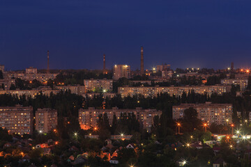 Fototapeta na wymiar Cityscape aerial view in the evening in the big city of Eastern Europe