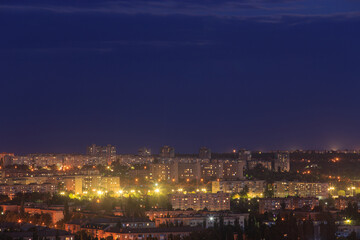 Fototapeta na wymiar Cityscape aerial view in the evening in the big city of Eastern Europe