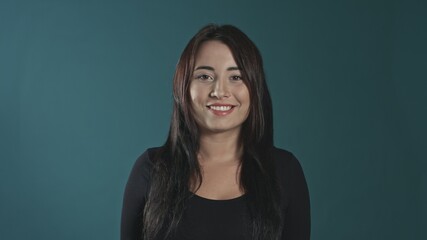 Fototapeta premium Beautiful young woman looking left.