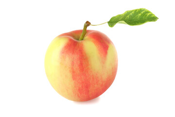 Red-yellow apple with leaf isolated on white