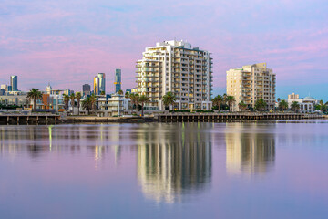 Luxury apartments with city skyline in the background in Port Melbourne, Australia