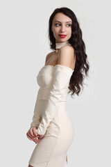 Fototapeta premium Fashionable beautygirl in a dress