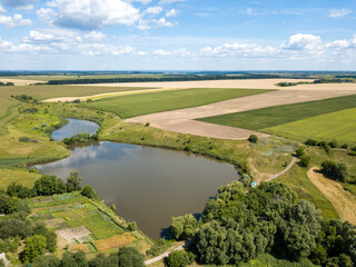 Aerial drone view. Ukrainian agricultural fields in summer.