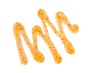 Orange thick jam drizzle, isolated on white background. Mandarin marmalade, Sea buckthorn jam, topping drops. Top view.