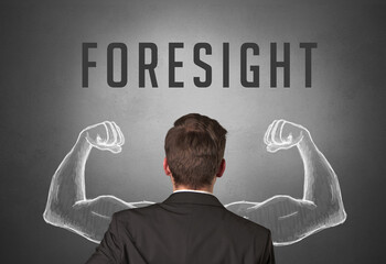 Rear view of a businessman with FORESIGHT inscription, powerfull business concept