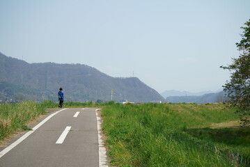 Take a walk on the embankment road on a sunny day