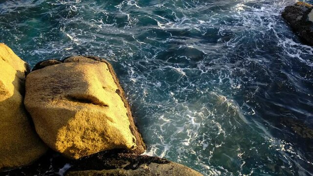 Ocean waves crashing and foaming.