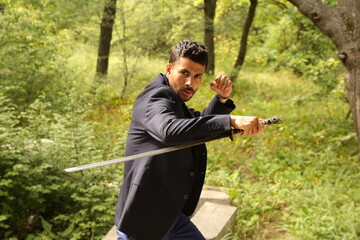 Man with a katana sword in a fighting pose