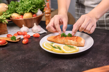 Fresh Salmon steak with salad. Online learning for cooking diet and healthy food when stay at home...