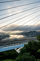 Plakat 長崎県長崎市　女神大橋から見る曇り空の長崎の風景