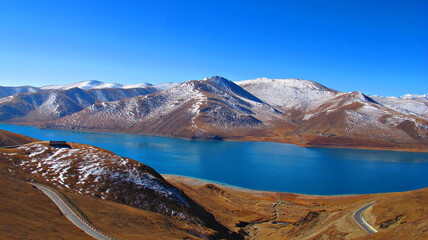 Yamdrok Lake is a freshwater lake in Tibet, it is one of the three largest sacred lakes in Tibet. It is over 72 km long. The lake is surrounded by many snow mountain.