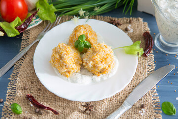 Home meatballs with spices on concrete background