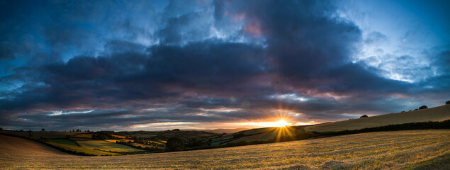 The colors of the sunset. Panorama of Labrador Bay in Devon in England.