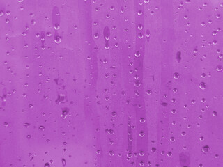 Drops after rain on the fogged film. Raindrops on the glass.