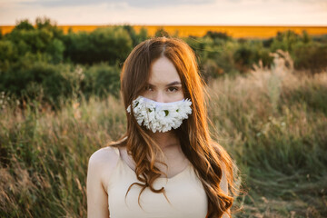 Statement Masks, Blinged out diy flower face mask design. Girl in face mask decorated with flowers...