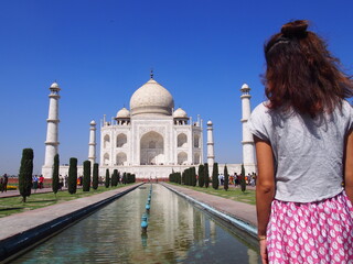 Taj Mahal and a woman with blue sky, Agra, Uttarpradesh, North India, India