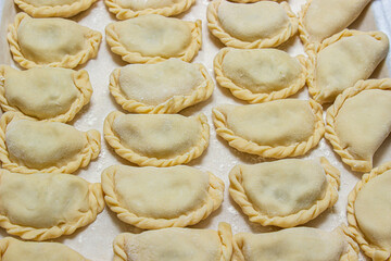 Vareniki. Homemade dumplings. Handmade dough food. Russian kitchen.