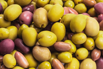 Tasty mix olives background.