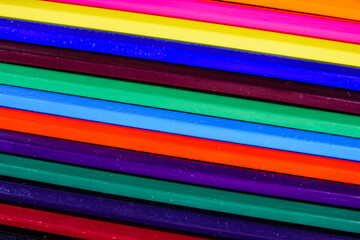 Background of many multi colored pencils