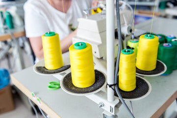 Fabric industry production line. Textile factory. Working tailoring process
