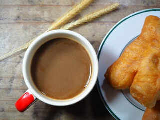 Empty coffee, white mugs on wooden floors and free space
