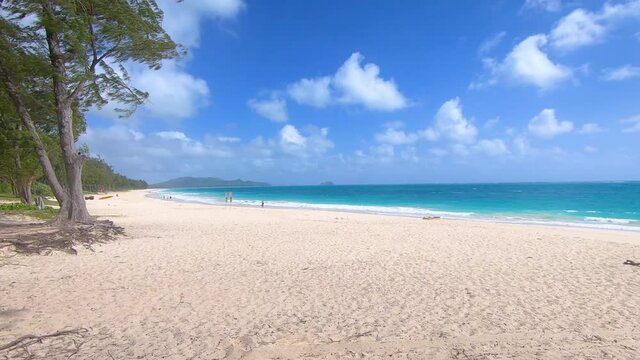 Paradise beaches with white sand and crystal blue sea at Hawaiian island Oahu.