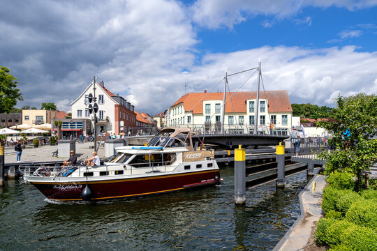 MALCHOW, GERMANY - JUNE 8, 2020: motorboat passing the Malchow swing bridge