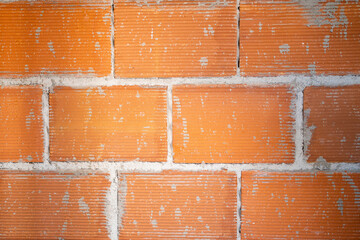 Brickwork background. House or site under construction. Building brick wall structure. Red brick wall
